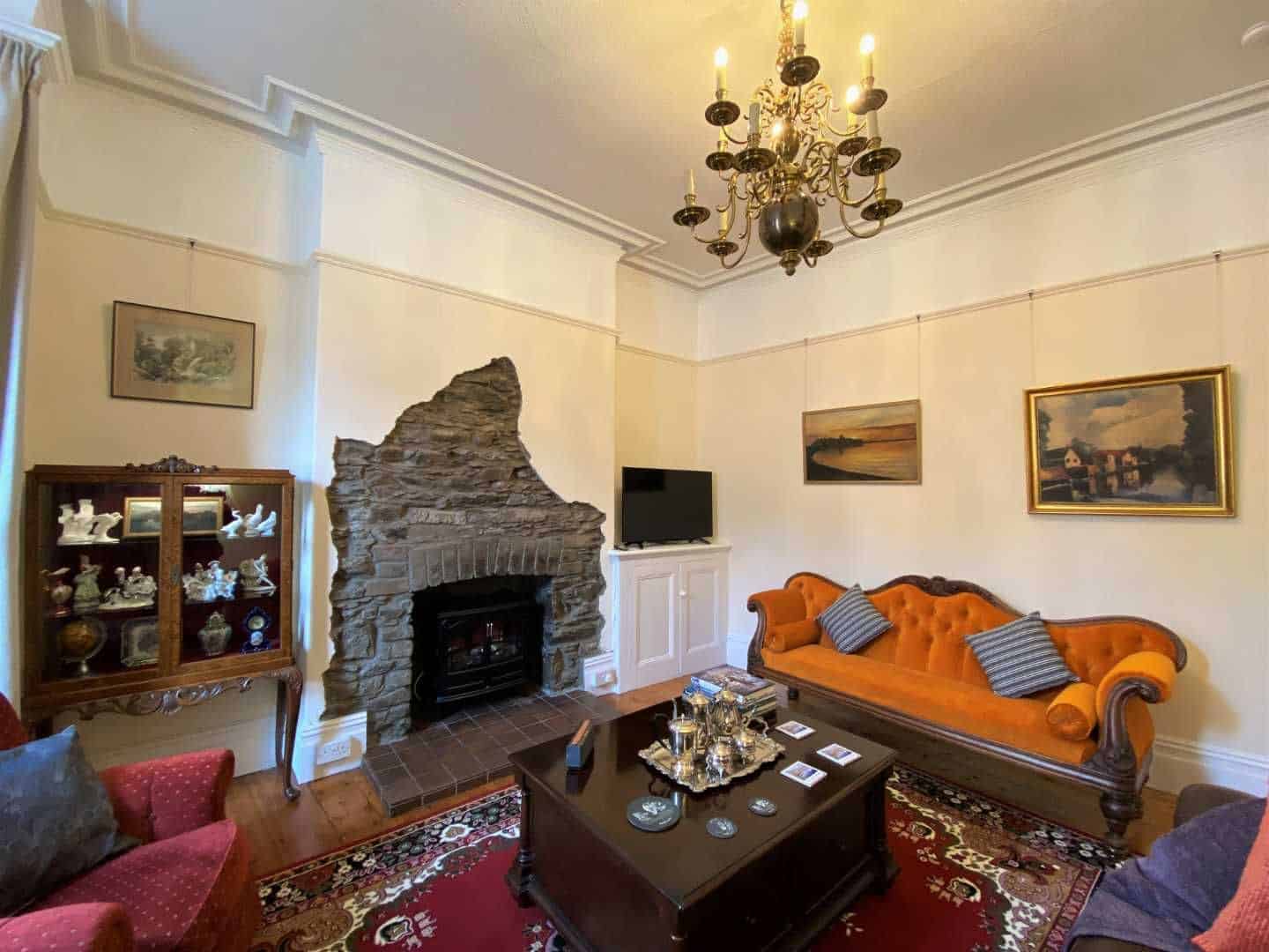 Victorian lounge with Manx stone fireplace