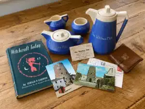 The historical collection at the Witches Mill related with the Museum of Magic and Witchcraft First edition of Gerald Gardner's Witchcraft Today displayed with historical objects from the Witches Mill museum.